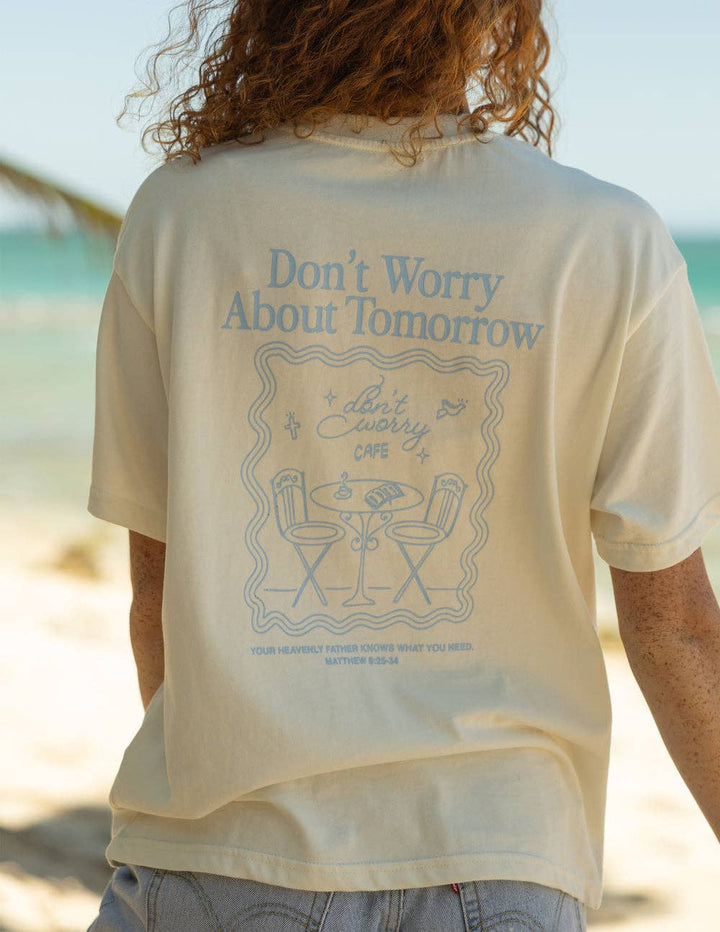 white t-shirt with 'Don't Worry About Tomorrow' text 