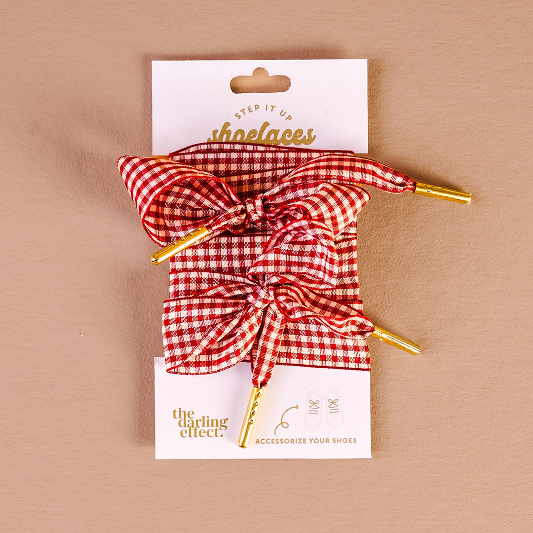 Red and white checkered shoelaces with gold accents, gingham red shoelaces