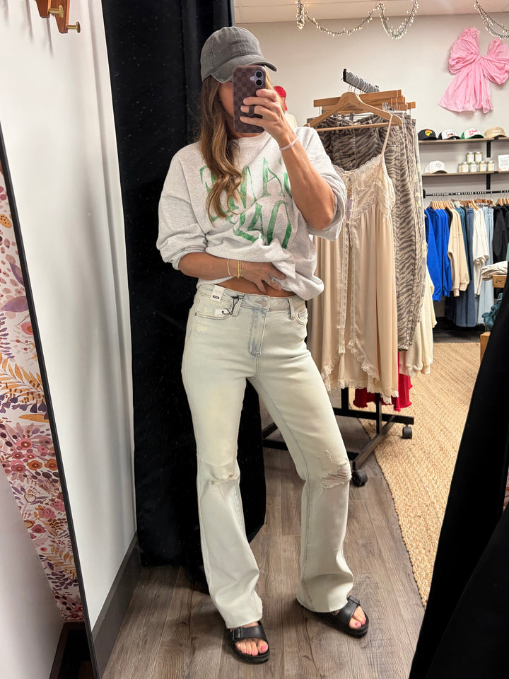 Light wash Judy Blue Jeans with frayed hem and light distressing
