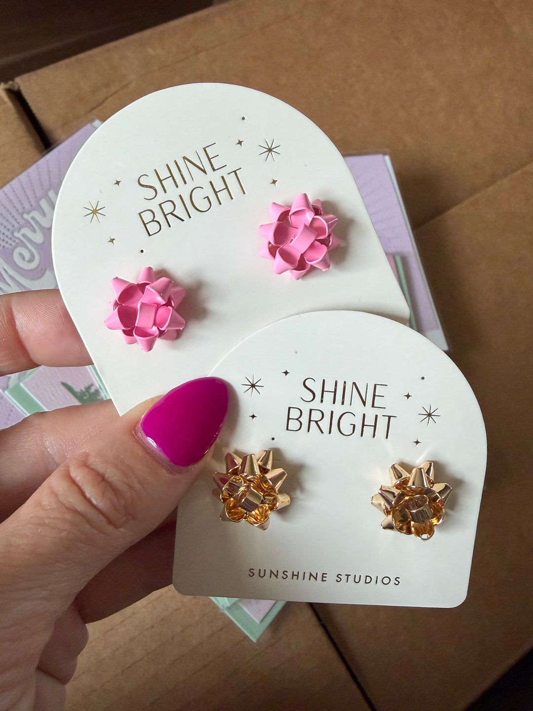 Pink holiday gift bow stud earrings