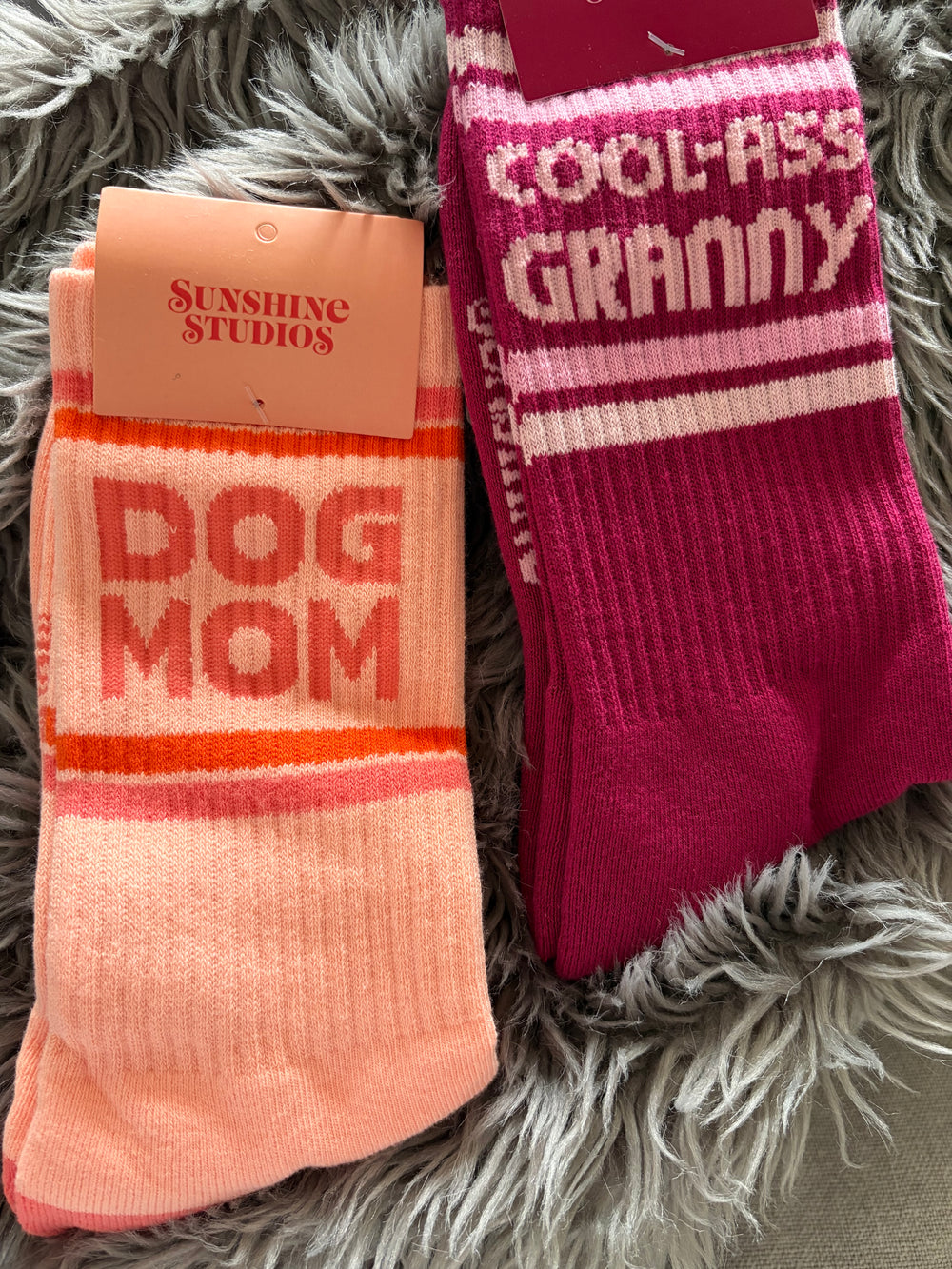 Dark pink crew socks that say Cool Ass Granny