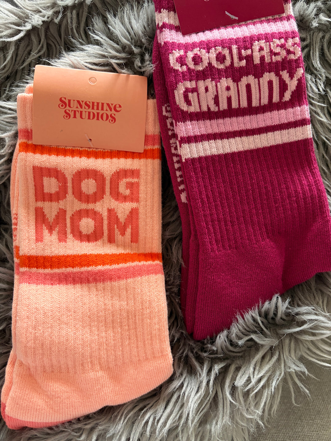 Dark pink crew socks that say Cool Ass Granny