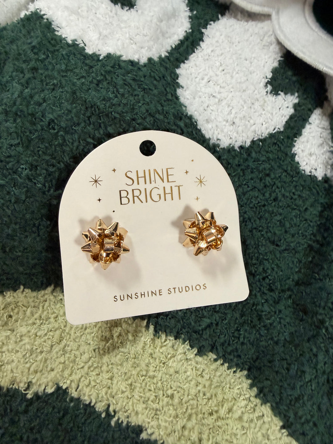 Gold holiday gift bow stud earrings