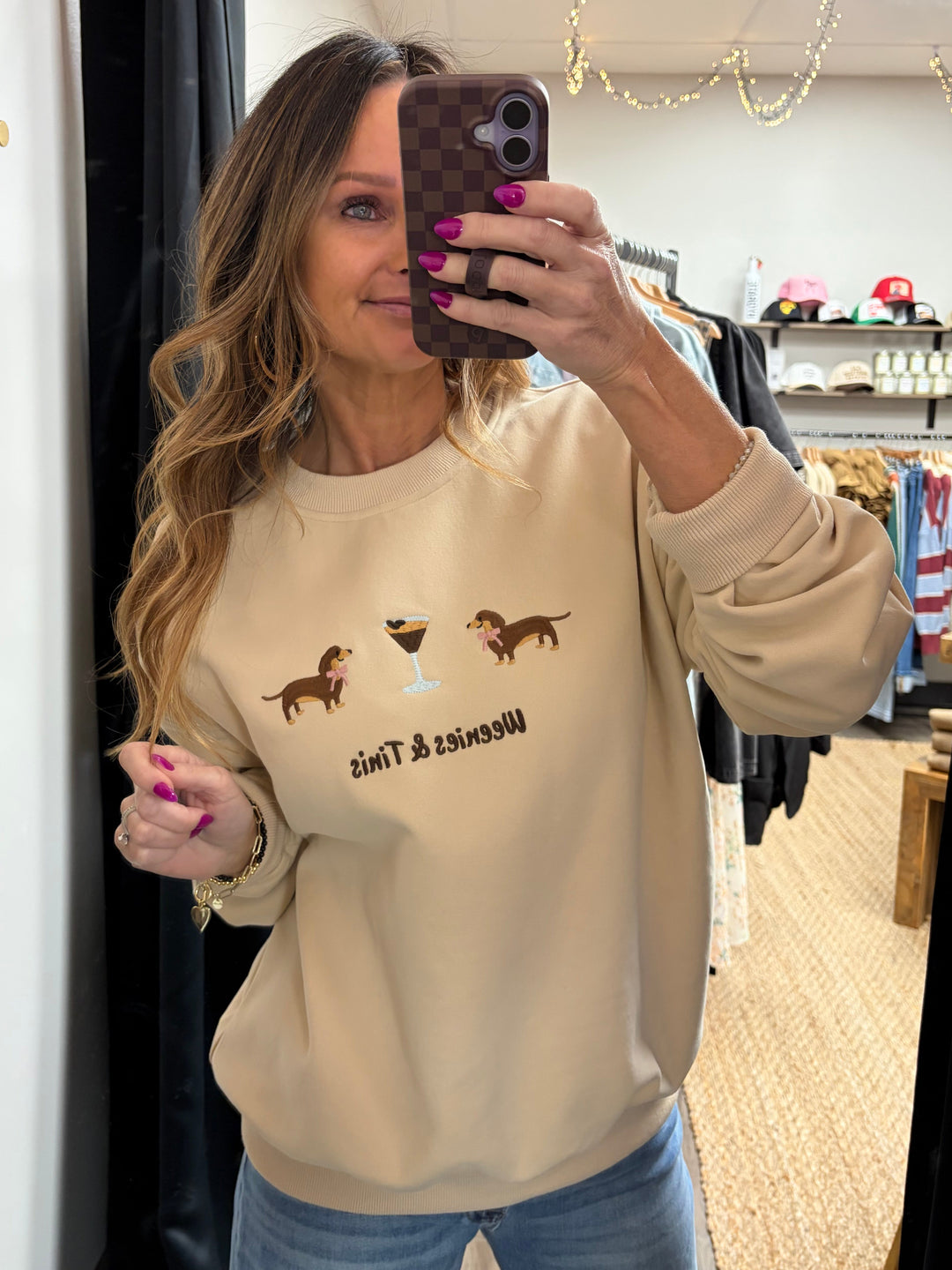 Tan beige crewneck sweatshirt with the phrase ‘weenies & tinis’ on it, dachshund dogs and martini glass