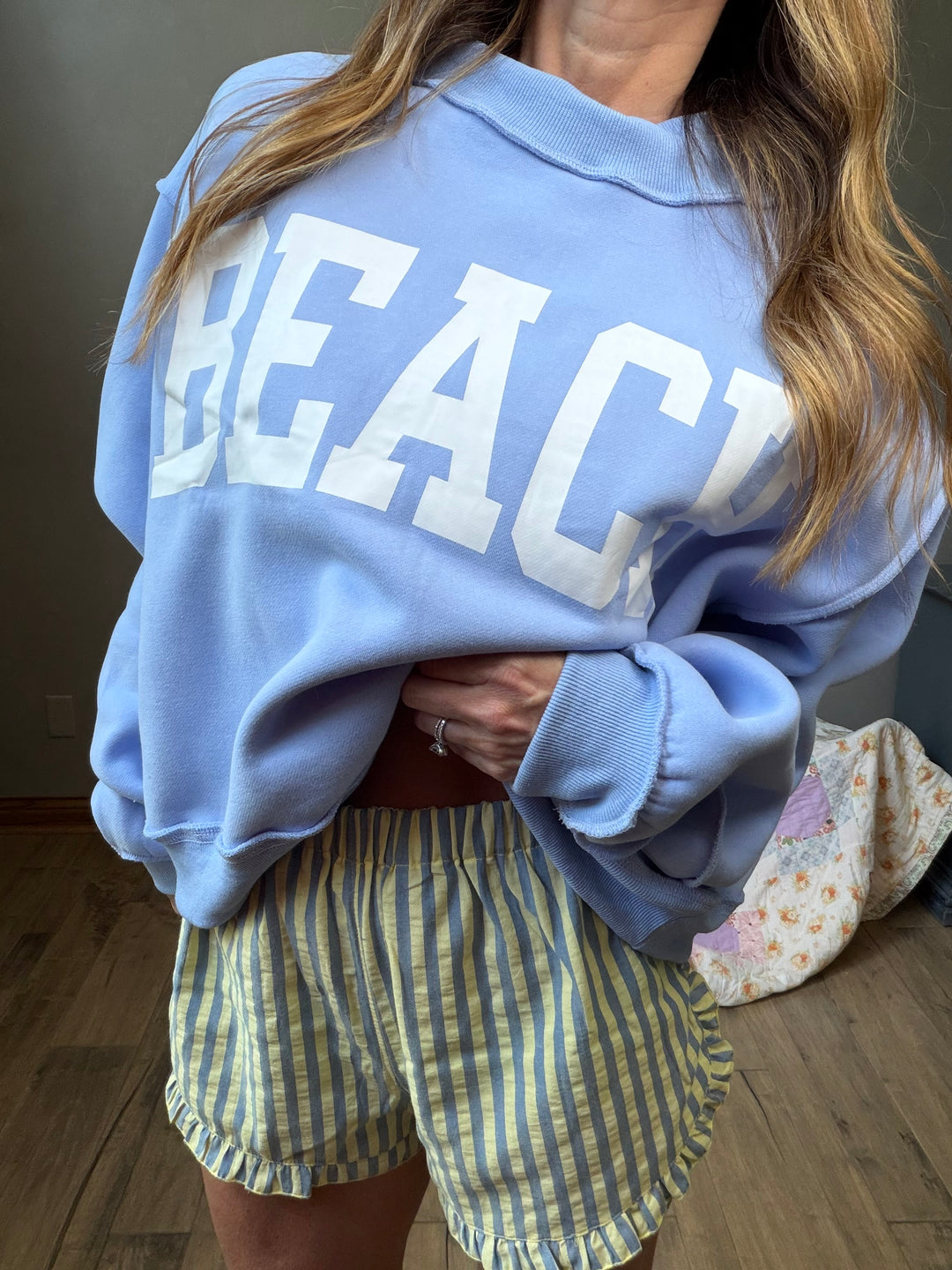 Light blue reversible mockneck cropped sweatshirt with BEACH on one side and LAKE on the other
