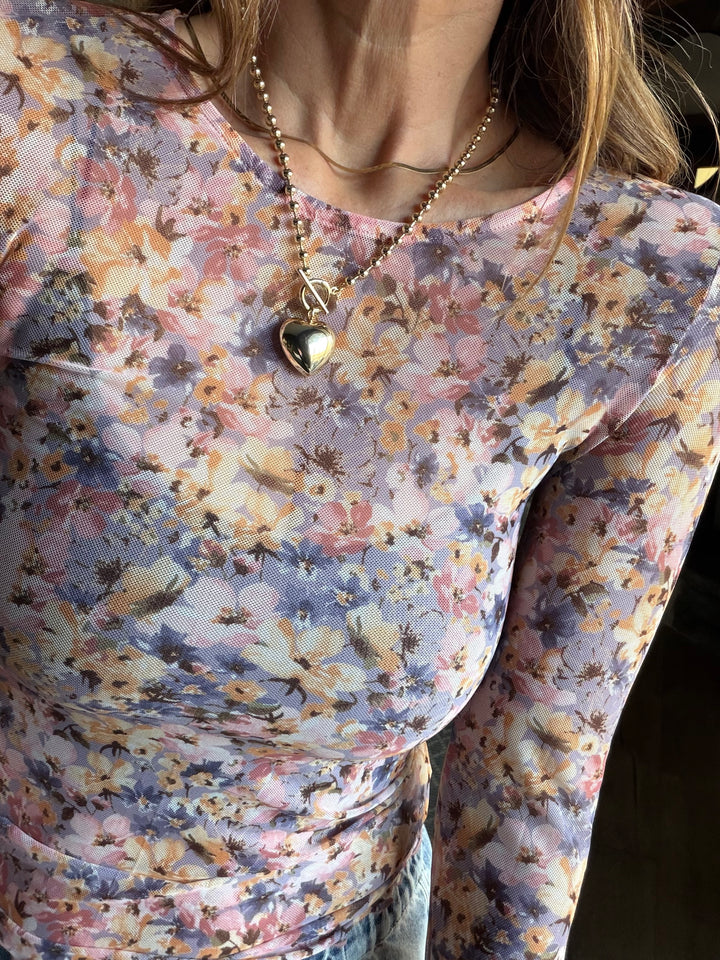 Floral mesh top with thumbholes, shades of purple, orange, pink and yellow